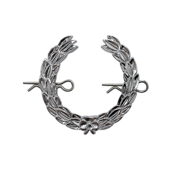 delicate nickel military cap badge