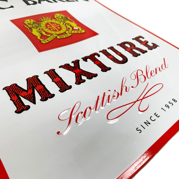 the detail of custom embossed metal sign
